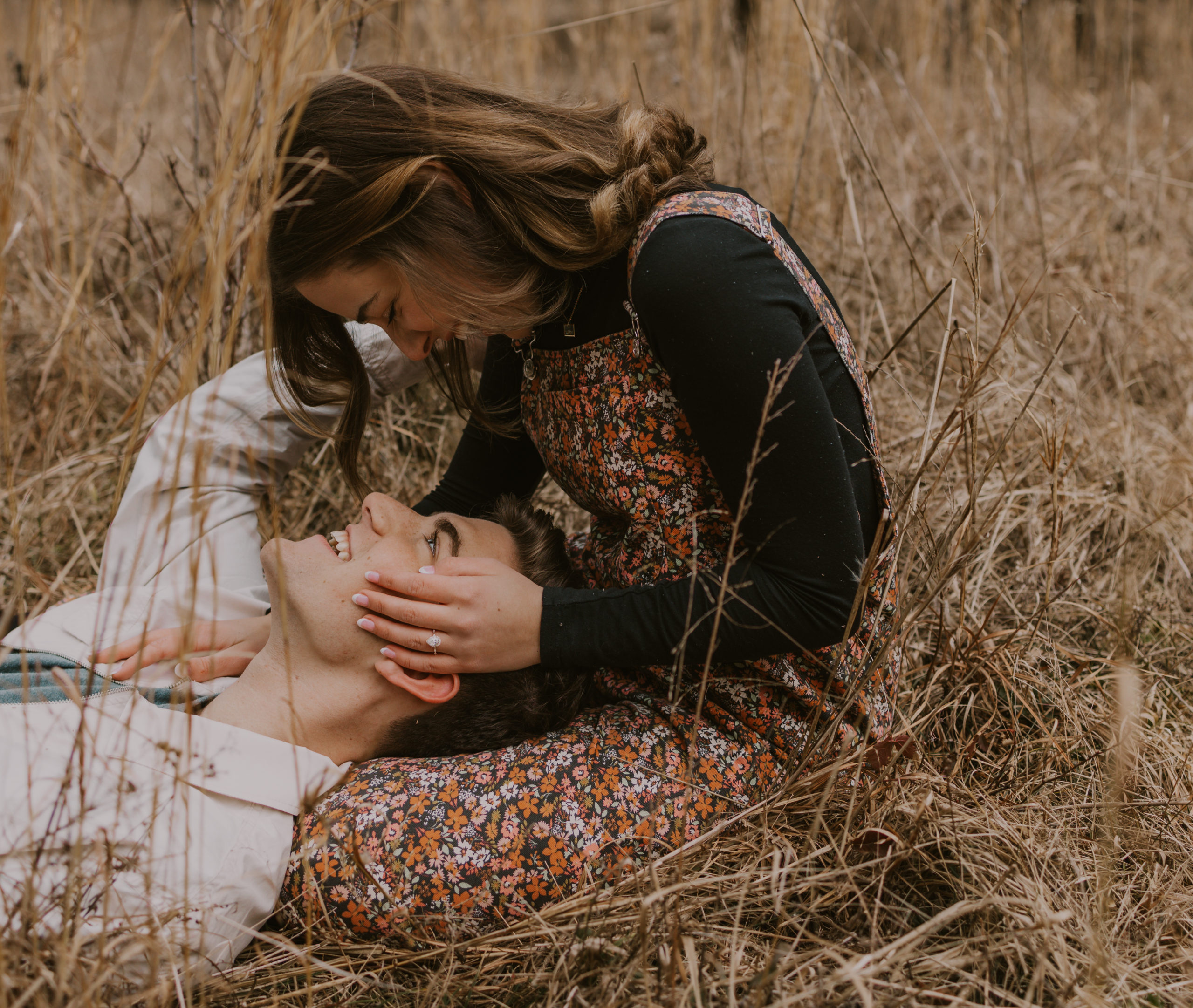 An engagement photoshoot in a field at Long Hunter State Park in Nashville, Tennessee.