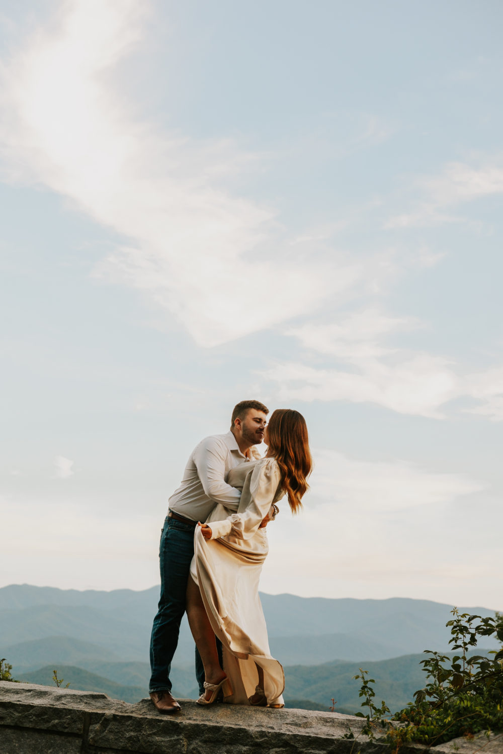 A couple high above the Great Smoky Mountains on their elopement day.