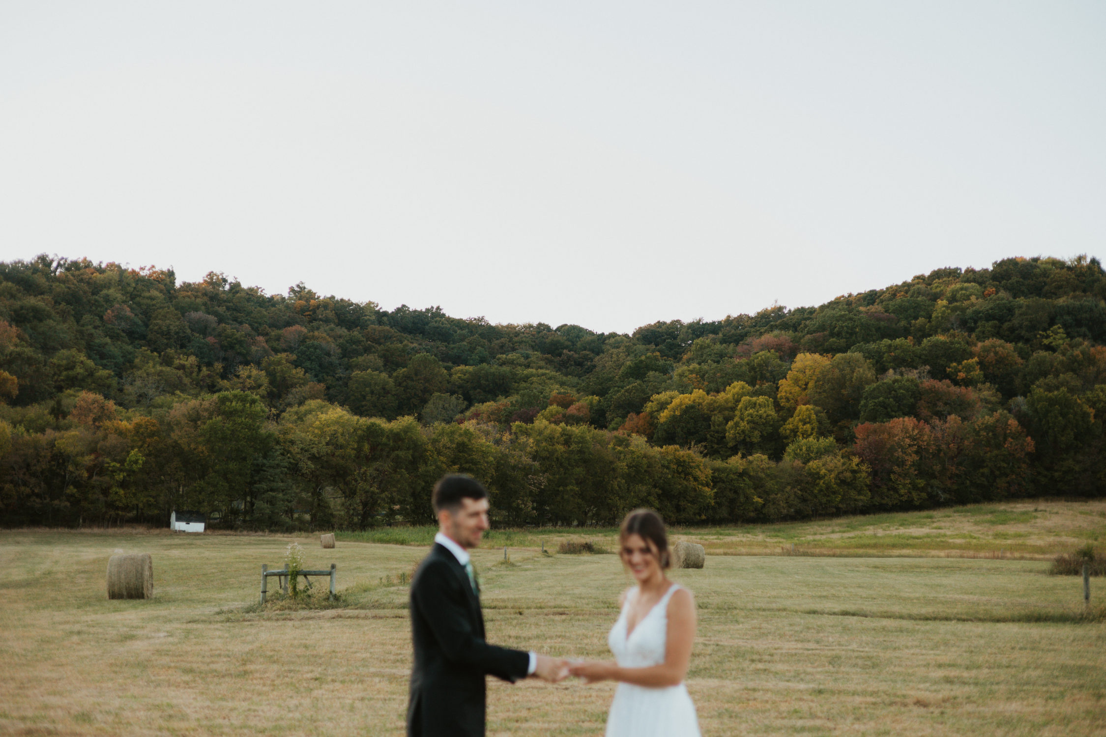 Bride and groom hold hands during their fall Tennessee elopement