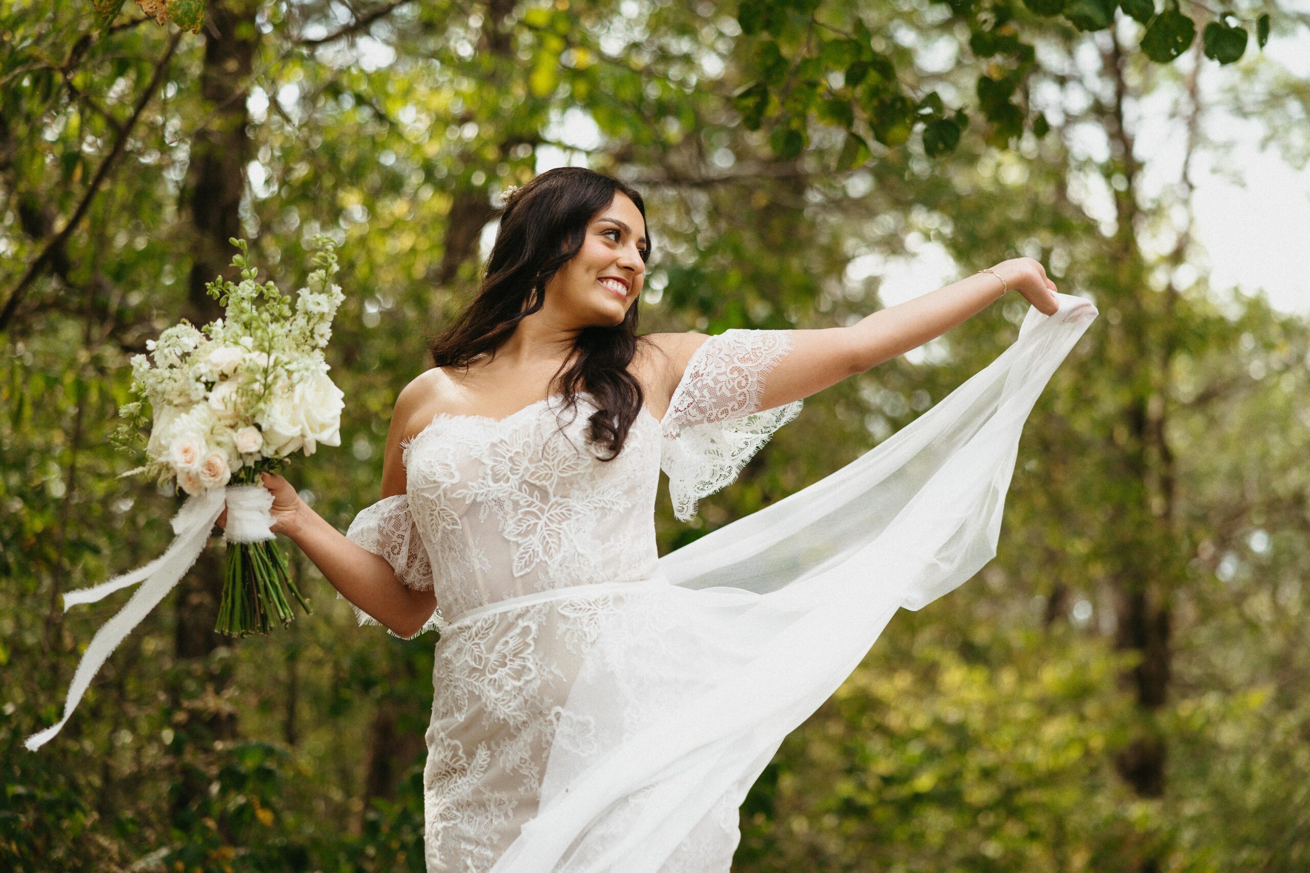A bride smiles for a portrait at Cedars of Lebanon State Park.