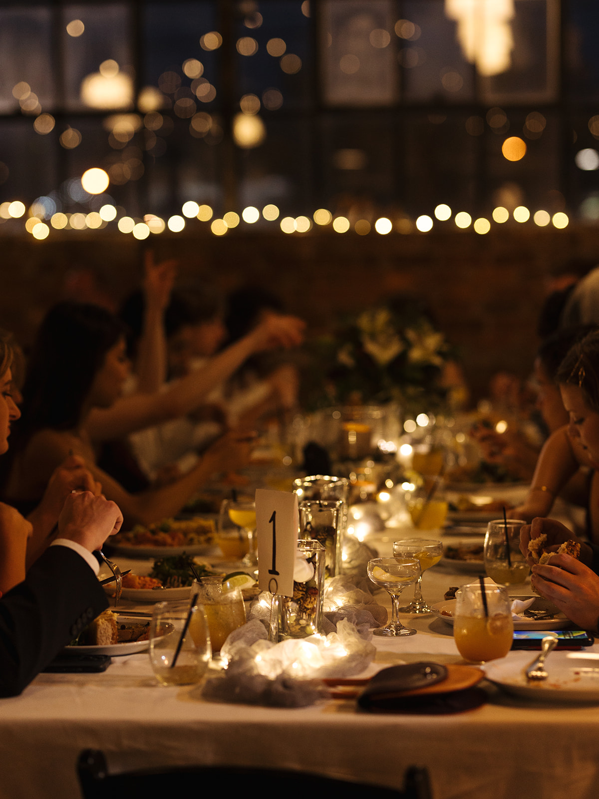 A candlelit wedding reception at pizza shop in Nashville, Tennessee.