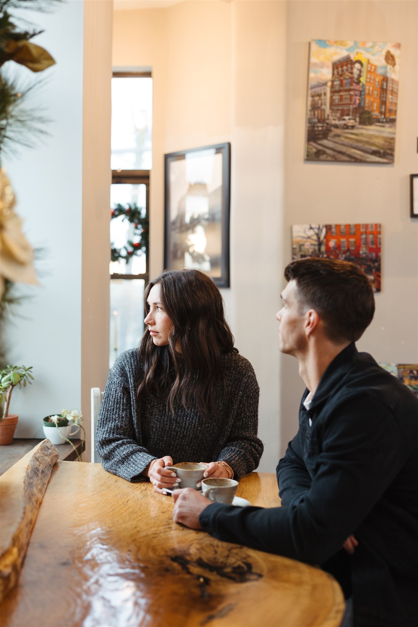 A cozy winter coffee shop engagement session in downtown Cincinnati by Nicole Kiser